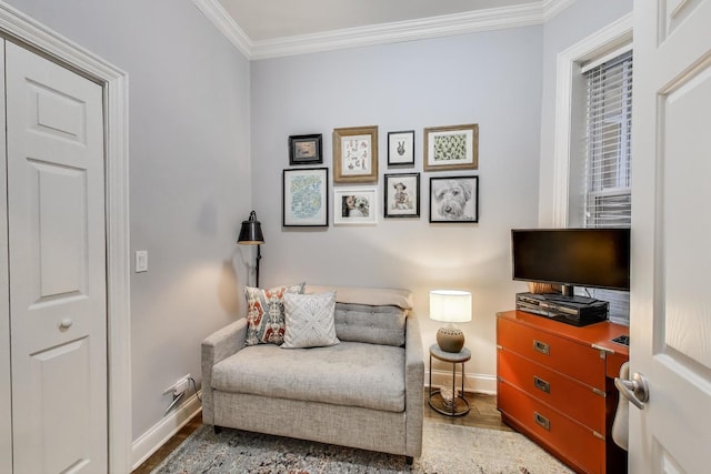 1908 N Whipple St Unit 2, Chicago, IL 60647 - sitting room featuring baseboards, crown molding, and wood finished floors