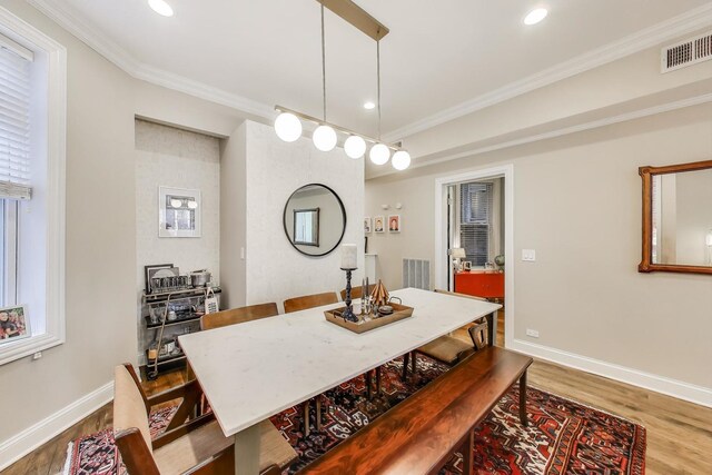 1908 N Whipple St Unit 2, Chicago, IL 60647 - dining room featuring wood finished floors, ornamental molding, recessed lighting, and baseboards
