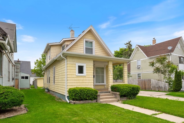 572 Walnut Ave, Elgin, IL 60123 - view of front facade with a chimney