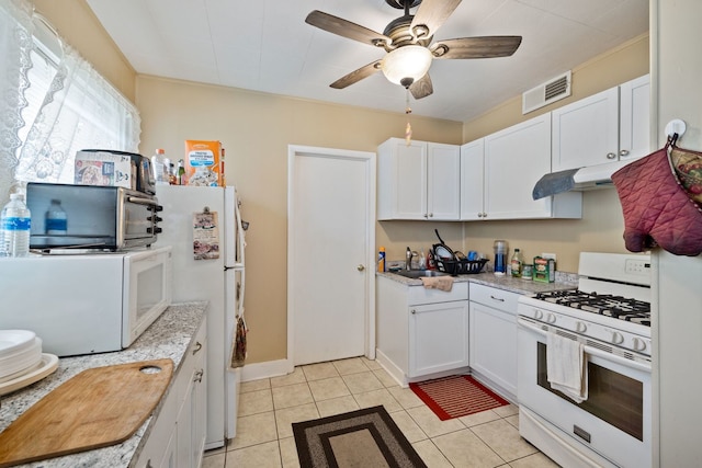 572 Walnut Ave, Elgin, IL 60123 - kitchen with white appliances, a sink, a ceiling fan, and white cabinetry