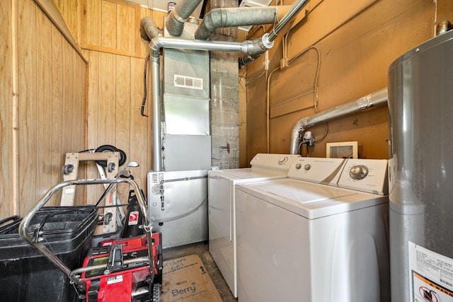 572 Walnut Ave, Elgin, IL 60123 - laundry area with washing machine and clothes dryer and water heater