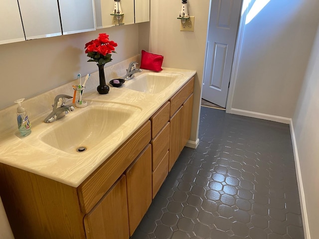 731 Viola Ct, Schaumburg, IL 60194 - bathroom featuring double vanity and tile patterned flooring