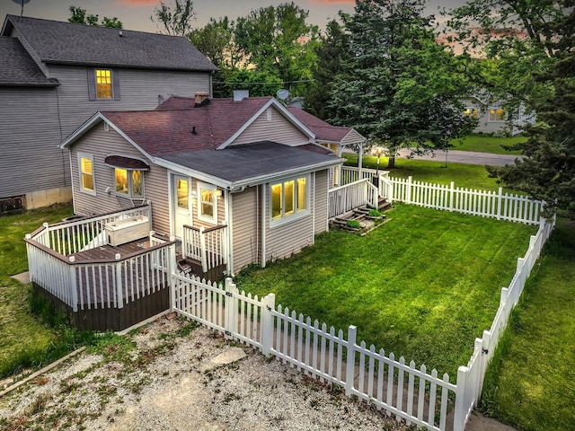 41672 N Dot Pl, Antioch, IL 60002 - back of house at dusk with a deck and roof with shingles