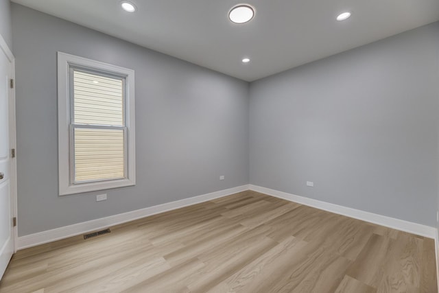 5731 S Damen Ave, Chicago, IL 60636 - spare room featuring light wood-style floors, baseboards, and recessed lighting