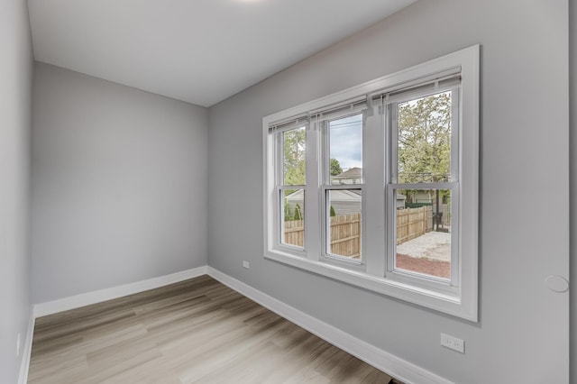 5731 S Damen Ave, Chicago, IL 60636 - unfurnished room with baseboards and wood finished floors