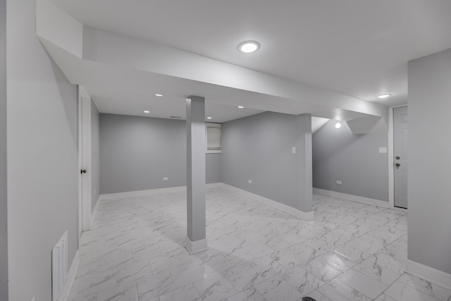 5731 S Damen Ave, Chicago, IL 60636 - finished below grade area with baseboards, light marble finish flooring, and recessed lighting