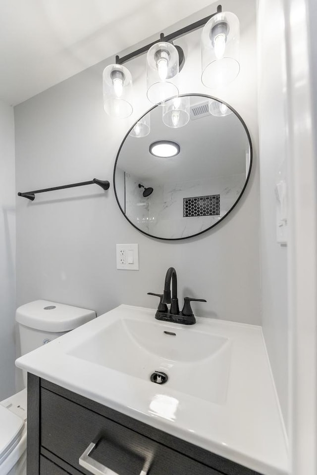 5731 S Damen Ave, Chicago, IL 60636 - bathroom with toilet and vanity