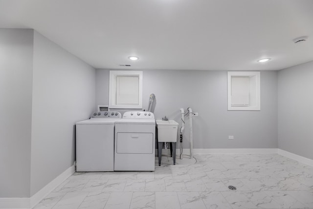 5731 S Damen Ave, Chicago, IL 60636 - washroom with washer and dryer, light marble finish flooring, recessed lighting, and baseboards