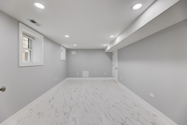 5731 S Damen Ave, Chicago, IL 60636 - below grade area with recessed lighting, baseboards, and marble finish floors