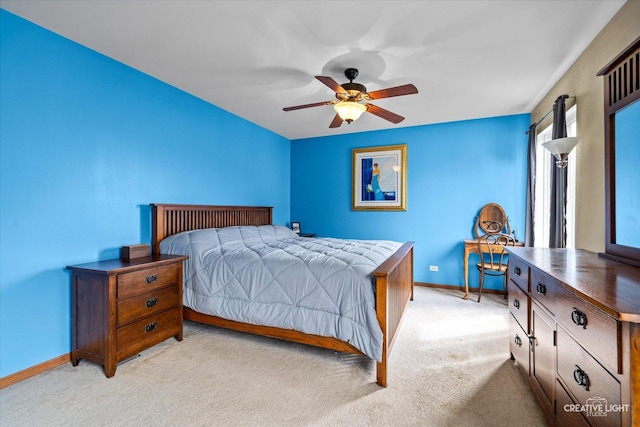 1057 Wright Ct, Plano, IL 60545 - bedroom with light colored carpet, baseboards, and a ceiling fan