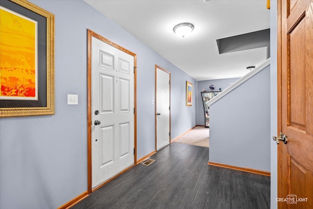 1057 Wright Ct, Plano, IL 60545 - foyer with baseboards and dark wood-style floors