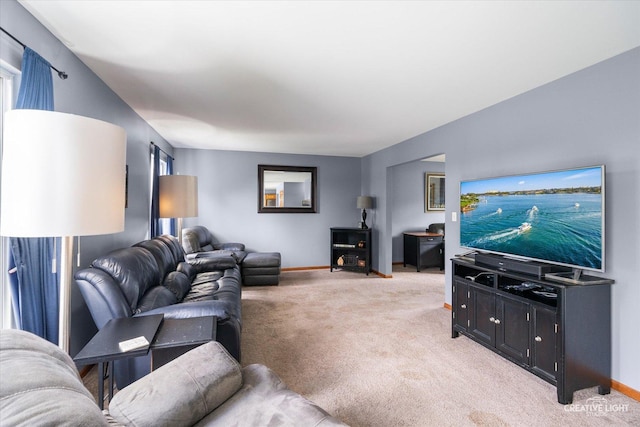 1057 Wright Ct, Plano, IL 60545 - living room featuring light colored carpet and baseboards