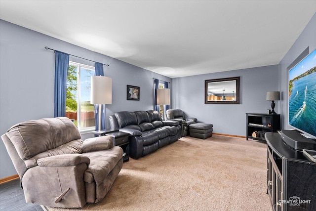 1057 Wright Ct, Plano, IL 60545 - living area with baseboards and carpet flooring