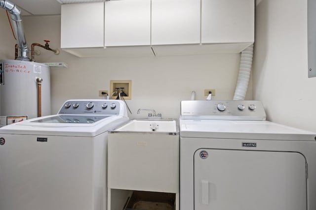 3640 186th St Unit 101, Lansing, IL 60438 - laundry area featuring washing machine and clothes dryer, cabinet space, and gas water heater