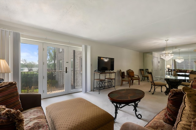 3640 186th St Unit 101, Lansing, IL 60438 - carpeted living room with a chandelier