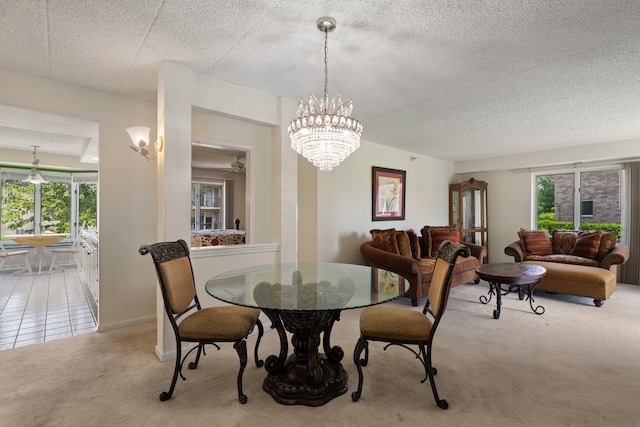 3640 186th St Unit 101, Lansing, IL 60438 - dining room with carpet floors, a chandelier, and a textured ceiling
