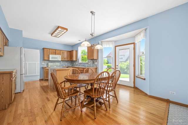 3151 Sawgrass Dr, Aurora, IL 60502 - dining space with light wood-type flooring and baseboards