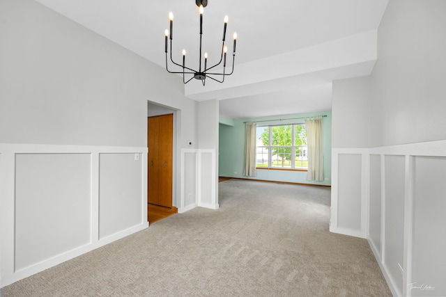 3151 Sawgrass Dr, Aurora, IL 60502 - carpeted spare room featuring a chandelier