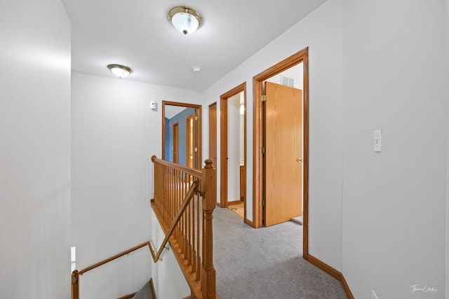 3151 Sawgrass Dr, Aurora, IL 60502 - hall featuring an upstairs landing, carpet floors, and baseboards