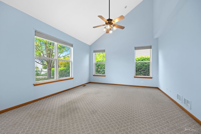 3151 Sawgrass Dr, Aurora, IL 60502 - spare room with carpet flooring, baseboards, a ceiling fan, and high vaulted ceiling