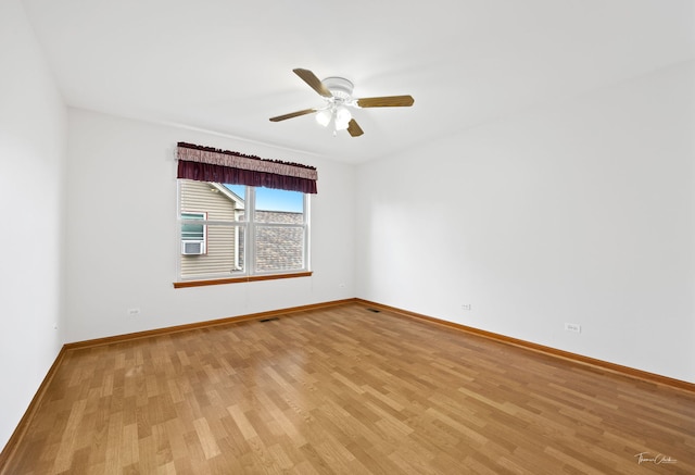 3151 Sawgrass Dr, Aurora, IL 60502 - spare room featuring light wood-style floors, baseboards, and a ceiling fan