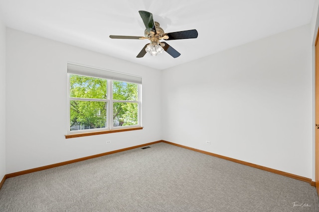 3151 Sawgrass Dr, Aurora, IL 60502 - empty room featuring carpet floors, baseboards, and a ceiling fan