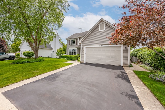 3151 Sawgrass Dr, Aurora, IL 60502 - traditional-style house with driveway and a garage