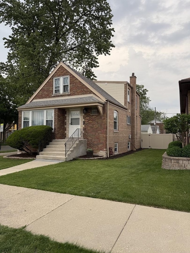 5301 S Mcvicker Ave, Chicago, IL 60638 - bungalow-style home featuring brick siding and a chimney
