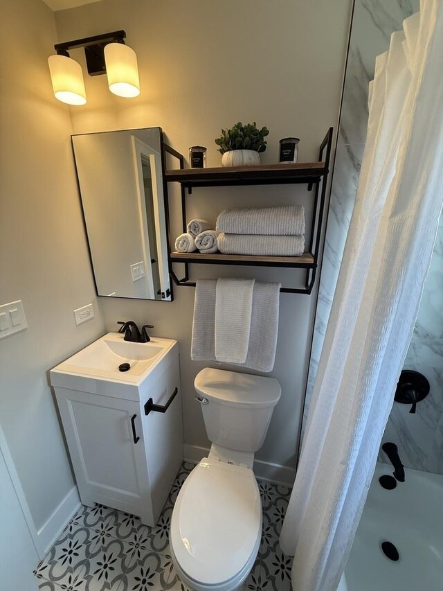 5301 S Mcvicker Ave, Chicago, IL 60638 - full bath with baseboards, vanity, toilet, and shower / bath combination with curtain