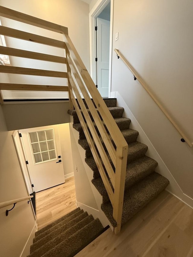 5301 S Mcvicker Ave, Chicago, IL 60638 - staircase featuring wood finished floors