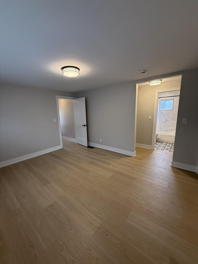 5301 S Mcvicker Ave, Chicago, IL 60638 - unfurnished room with wood finished floors and baseboards