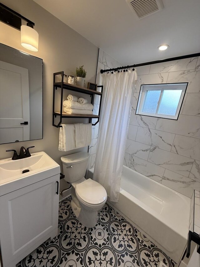 5301 S Mcvicker Ave, Chicago, IL 60638 - bathroom with toilet, shower / bath combo, vanity, and recessed lighting