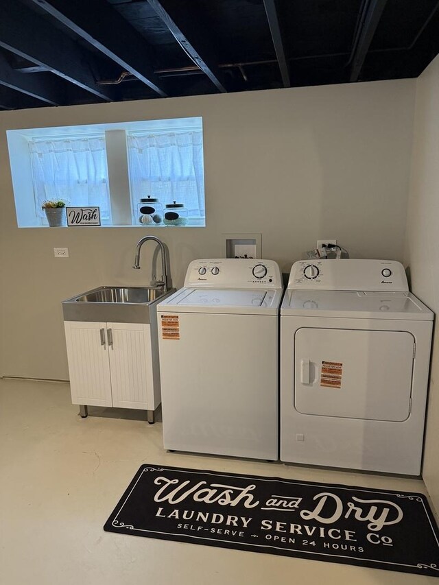 5301 S Mcvicker Ave, Chicago, IL 60638 - laundry area with washer and clothes dryer, a sink, and healthy amount of natural light