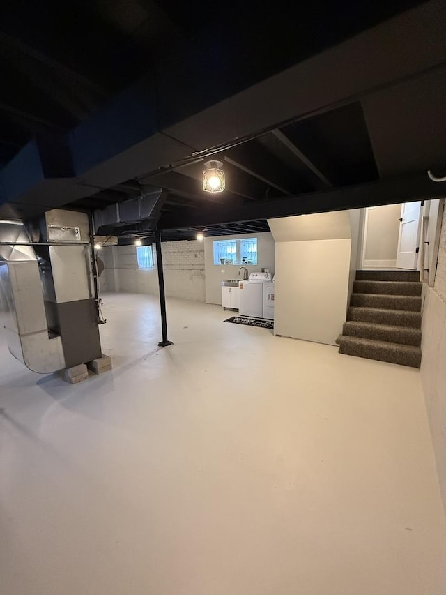 5301 S Mcvicker Ave, Chicago, IL 60638 - below grade area with washing machine and clothes dryer, stairs, and heating unit