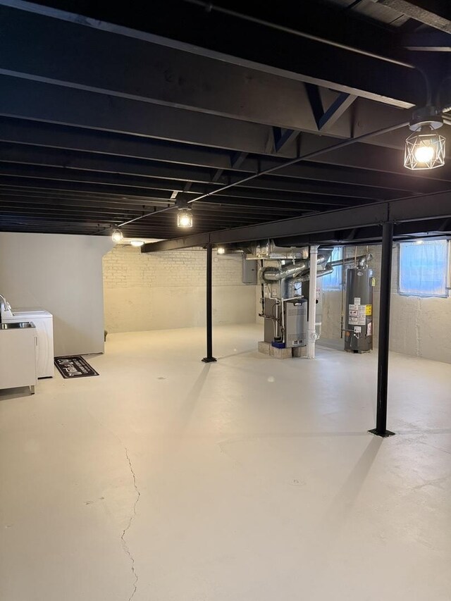 5301 S Mcvicker Ave, Chicago, IL 60638 - below grade area with water heater, independent washer and dryer, heating unit, and electric panel