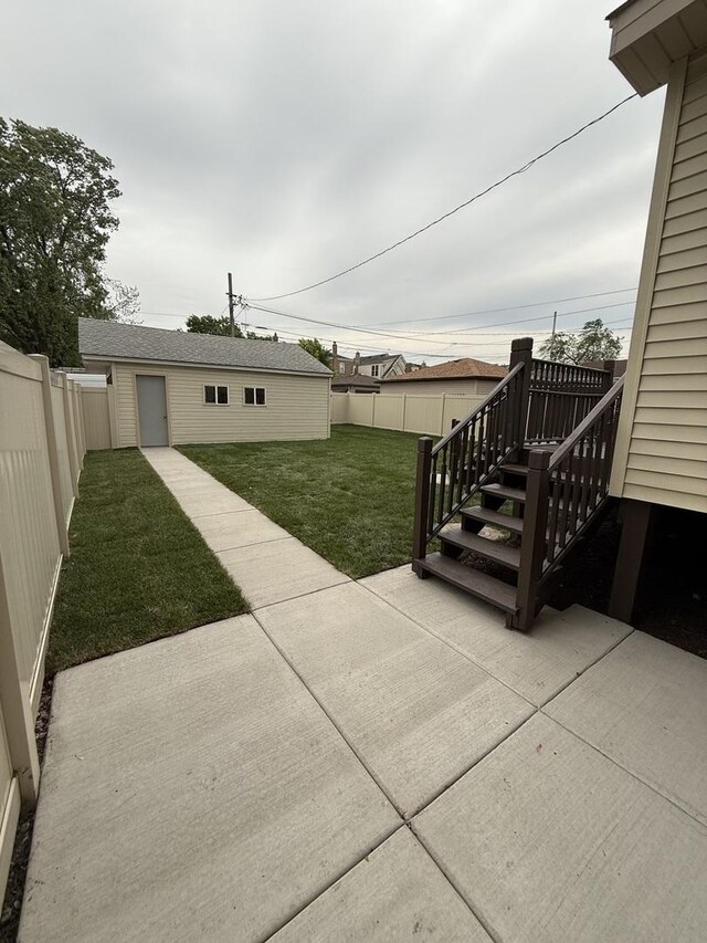5301 S Mcvicker Ave, Chicago, IL 60638 - view of patio / terrace featuring an outbuilding