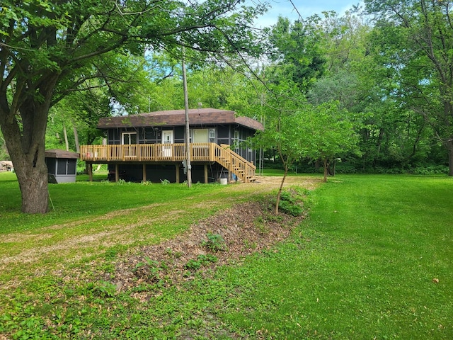 2820 S Brooks Island Rd, Oregon, IL 61061 - back of house featuring a yard, stairway, a deck, and a sunroom