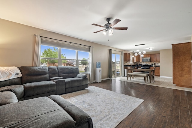 15826 Chippewa Ln, Manhattan, IL 60442 - living area featuring ceiling fan, light wood finished floors, and a chandelier