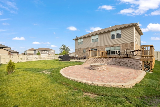 15826 Chippewa Ln, Manhattan, IL 60442 - back of house with a patio area, an outdoor fire pit, brick siding, and a deck