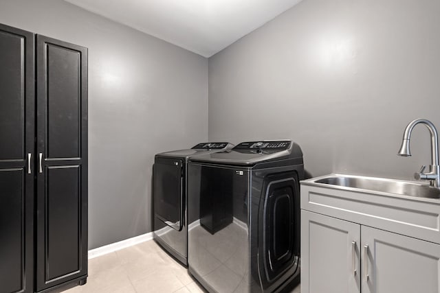 15826 Chippewa Ln, Manhattan, IL 60442 - washroom featuring separate washer and dryer, cabinet space, and light tile patterned flooring