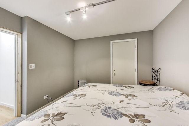 900 W Ainslie St Unit A, Chicago, IL 60640 - bedroom featuring track lighting and baseboards