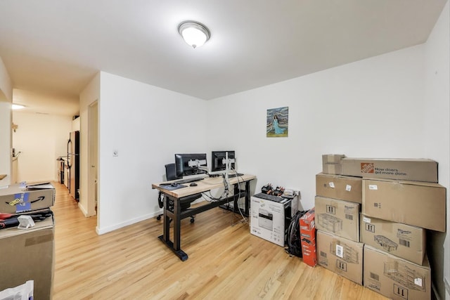 900 W Ainslie St Unit A, Chicago, IL 60640 - home office featuring light wood-type flooring and baseboards