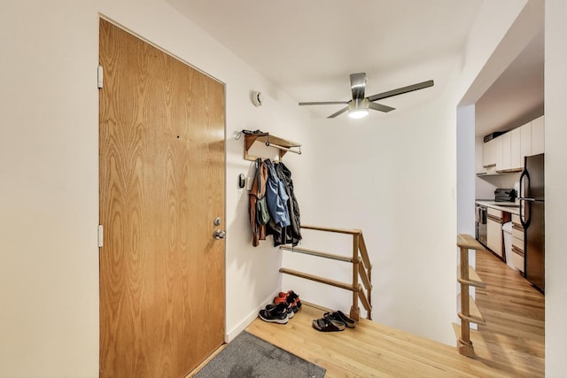 900 W Ainslie St Unit A, Chicago, IL 60640 - foyer featuring light wood-type flooring and ceiling fan