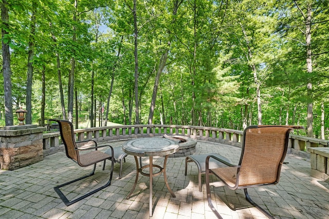 3085 W Southmor Rd, Morris, IL 60450 - view of patio featuring an outdoor fire pit