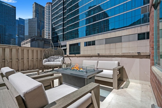 440 N Mcclurg Ct Unit 301, Chicago, IL 60611 - view of patio / terrace with a city view and an outdoor living space with a fire pit