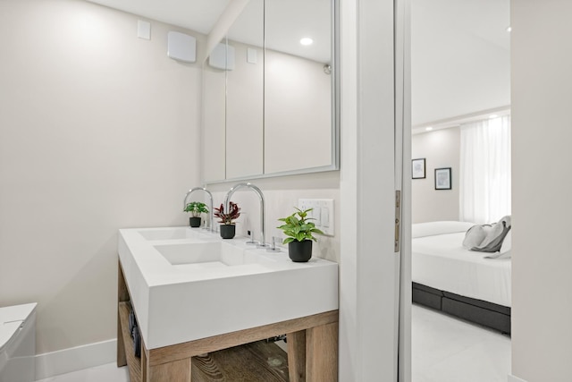 440 N Mcclurg Ct Unit 301, Chicago, IL 60611 - bathroom featuring vanity and recessed lighting