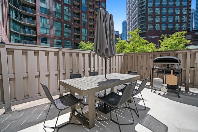 440 N Mcclurg Ct Unit 301, Chicago, IL 60611 - view of patio / terrace featuring a view of city and outdoor dining area