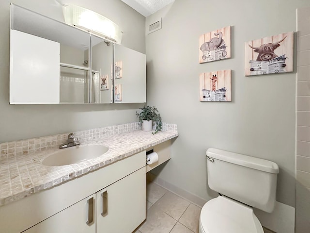 440 N Mcclurg Ct Unit 301, Chicago, IL 60611 - full bath with toilet, vanity, tile patterned flooring, an enclosed shower, and baseboards