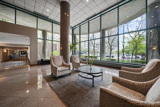 440 N Mcclurg Ct Unit 301, Chicago, IL 60611 - common area featuring a towering ceiling, a wall of windows, and recessed lighting