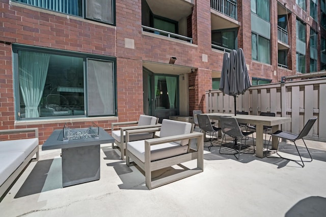 440 N Mcclurg Ct Unit 301, Chicago, IL 60611 - view of patio / terrace with outdoor dining area and an outdoor living space with a fire pit